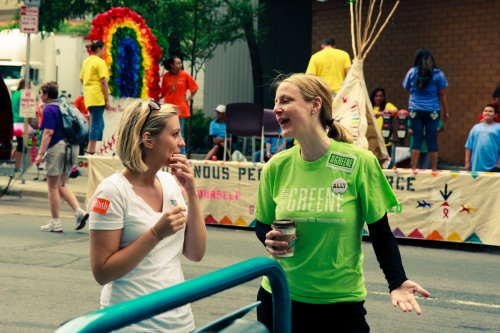 Rep. Marion Greene and Rep. Carly Melin talk at Twin Cities Pride.
